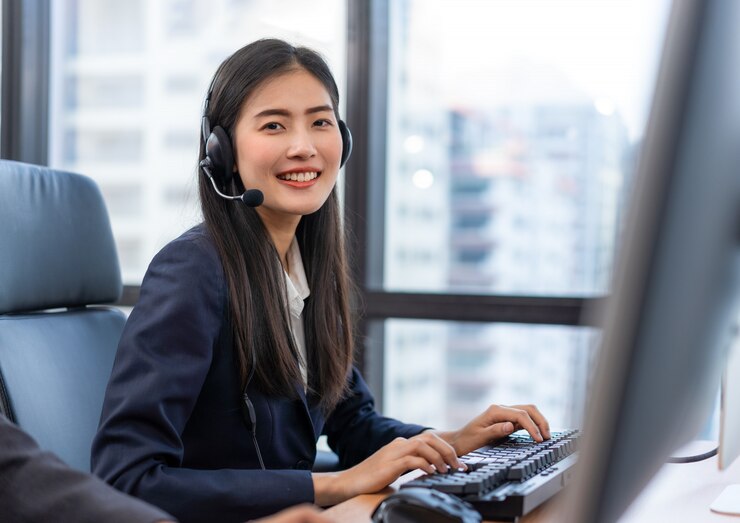 happy-smiling-operator-asian-woman-customer-service-agent-with-headsets_33413-180